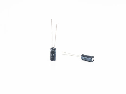 ISO9001 RoHS रेडियल लीड इलेक्ट्रोलाइटिक कैपेसिटर 1UF25V 5X11mm